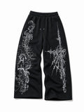 Gothic Reliquary black graphic sweatpants, natural flat lay front view on white