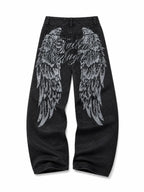 The Fallen Angel Graphic Jeans - natural flat lay black back view with silver wings on white