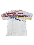 White oversized T-shirt with multicolor layered text graphic