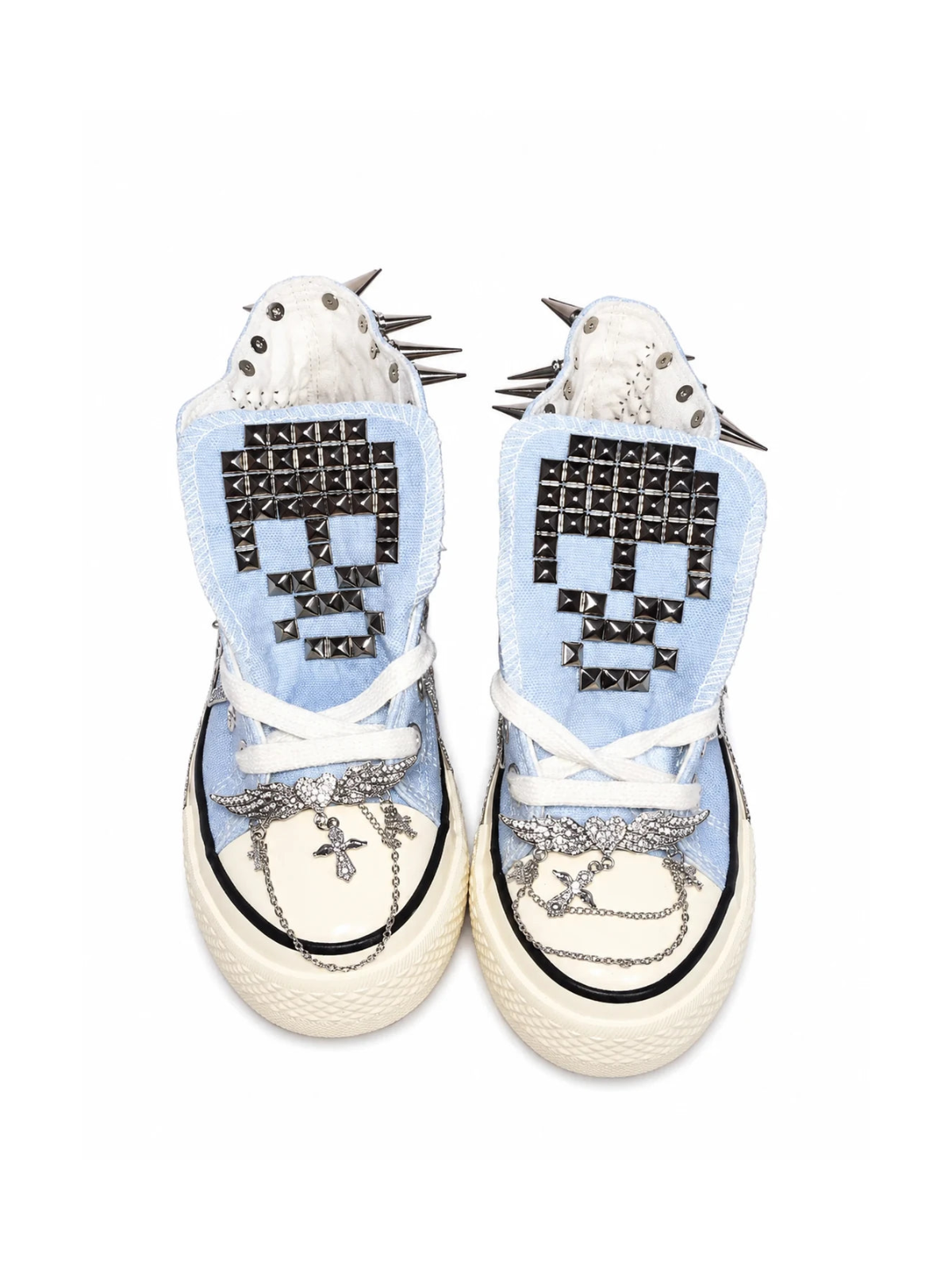 Baby blue studded high-top sneakers front top view with skull tongue studs and chain accents