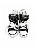 Black studded high-top sneakers front top view with skull tongue studs and white laces