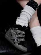 Black leopard silver rhinestone wedge sneakers close-up lifestyle photo