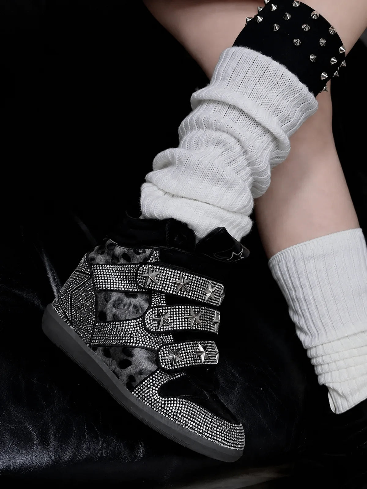 Black leopard silver rhinestone wedge sneakers close-up lifestyle photo