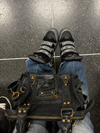 Black leopard silver rhinestone wedge sneakers top view with bag lifestyle photo