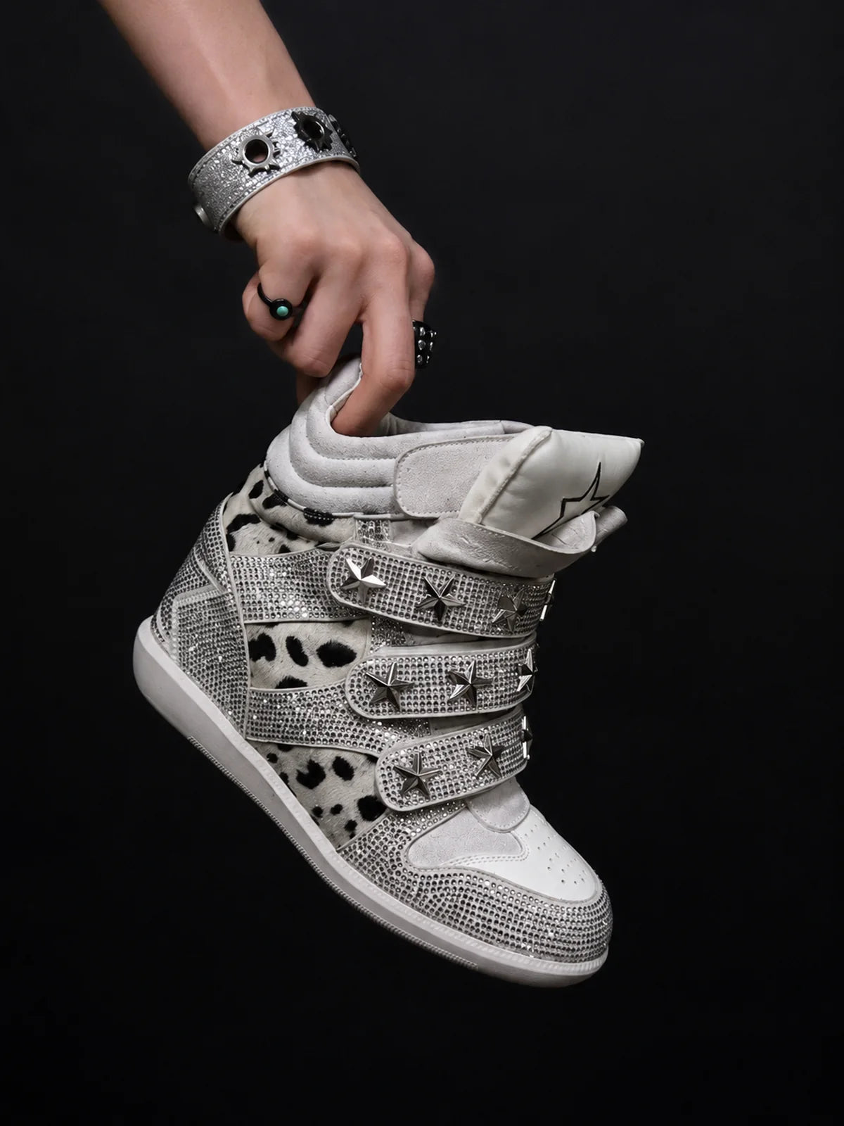 Ivory leopard silver rhinestone wedge sneakers hand-held detail photo