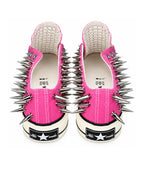 Pink spiked low-top sneakers rear detail on white background