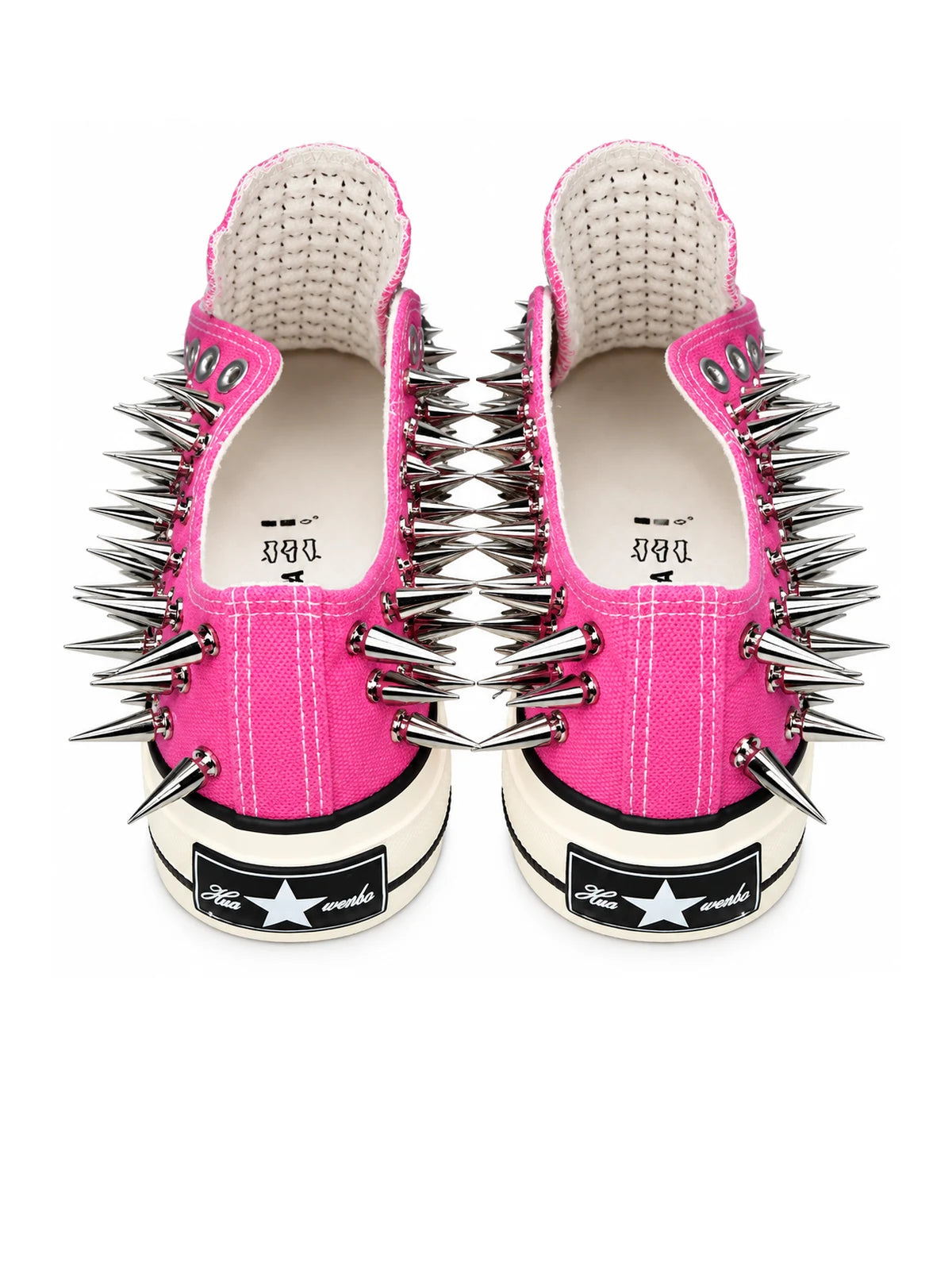 Pink spiked low-top sneakers rear detail on white background