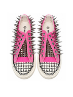 Pink spiked low-top sneakers top front detail on white background