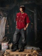 Black Riveted Fade Baggy Jeans red tee three-quarter styled look