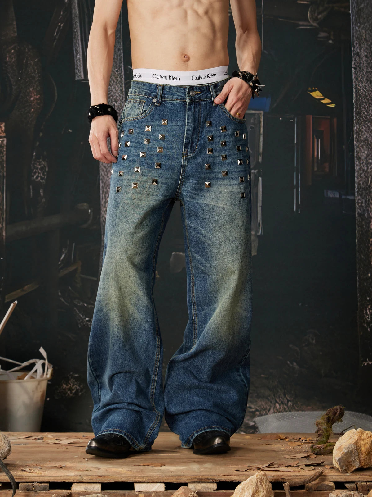 Blue Riveted Fade Baggy Jeans front pocket detail model view