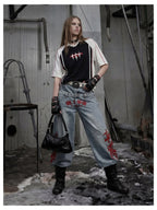 Blue Twin-Waist Dragon Baggy Jeans womens front styled look with hand in pocket