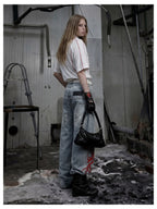 Blue Twin-Waist Dragon Baggy Jeans womens back three quarter styled look with bag
