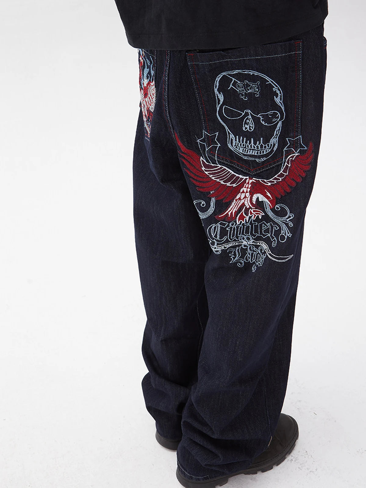 Denim Blue Winged Skull Baggy Jeans back three-quarter styled look