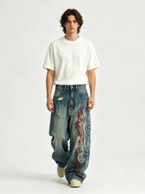 The "Tribal Flame" Embroidered Jeans in blue, studio front view