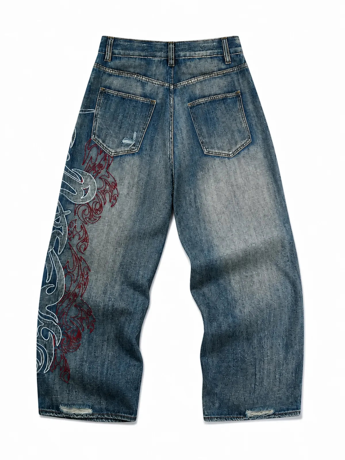 The Tribal Flame Embroidered Jeans in blue, natural flat lay on a pure white background, back view