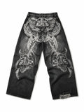 The Skeletal Wings Distressed Jeans in washed black, natural flat lay on a pure white background, back graphic view