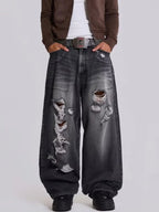 The Skeletal Wings Distressed Jeans styled on model, full-body front view