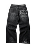The Polar Script Washed Jeans in black on a pure white background, back graphic view