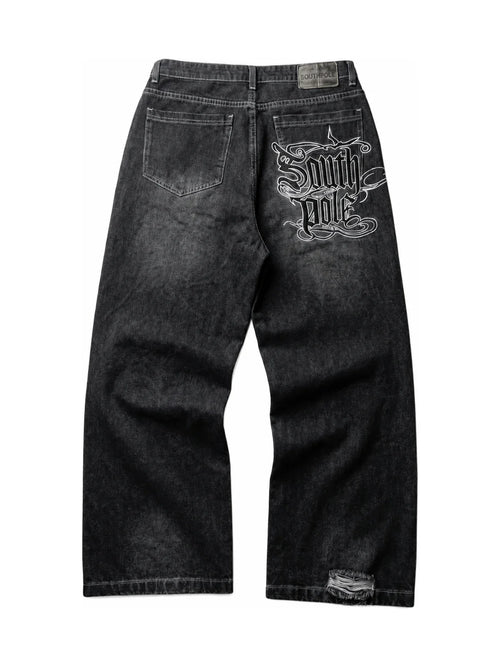 The Polar Script Washed Jeans in black on a pure white background, back graphic view