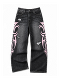 Black and pink Tribal Halo washed wide-leg jeans in a natural flat lay on a pure white background