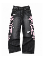 Black and pink Tribal Halo washed wide-leg jeans in a natural flat lay on a pure white background