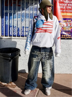 Blue Whispered Words Printed Jeans styled outdoors