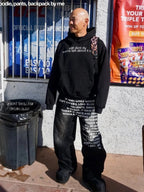 Black Whispered Words Printed Jeans styled outdoors