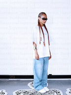 White Rebel Bones Skeleton Graphic Tee styled front view