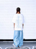 White and blue Rebel Bones Skeleton Graphic Tee styled back view