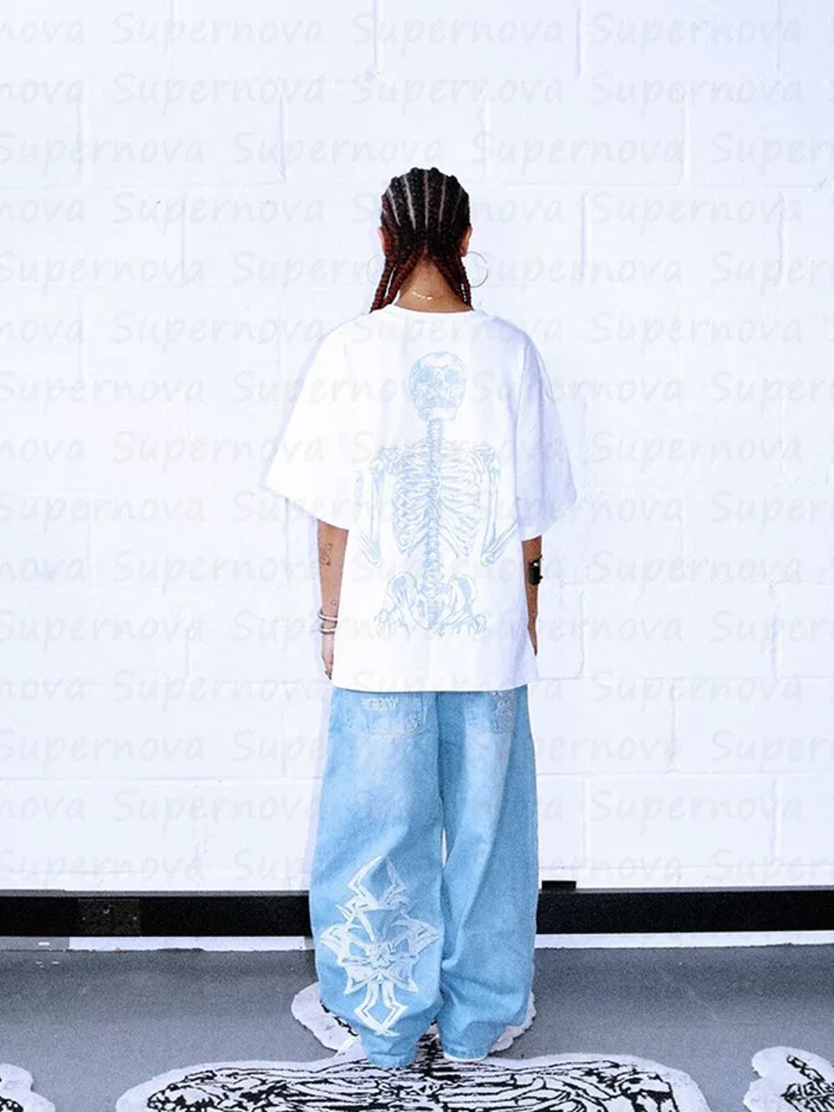 White and blue Rebel Bones Skeleton Graphic Tee styled back view