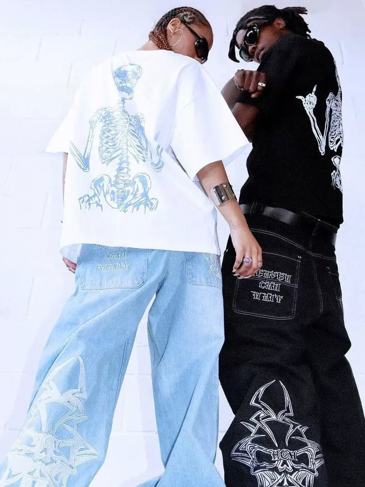 Black and white Rebel Bones Skeleton Graphic Tees styled together