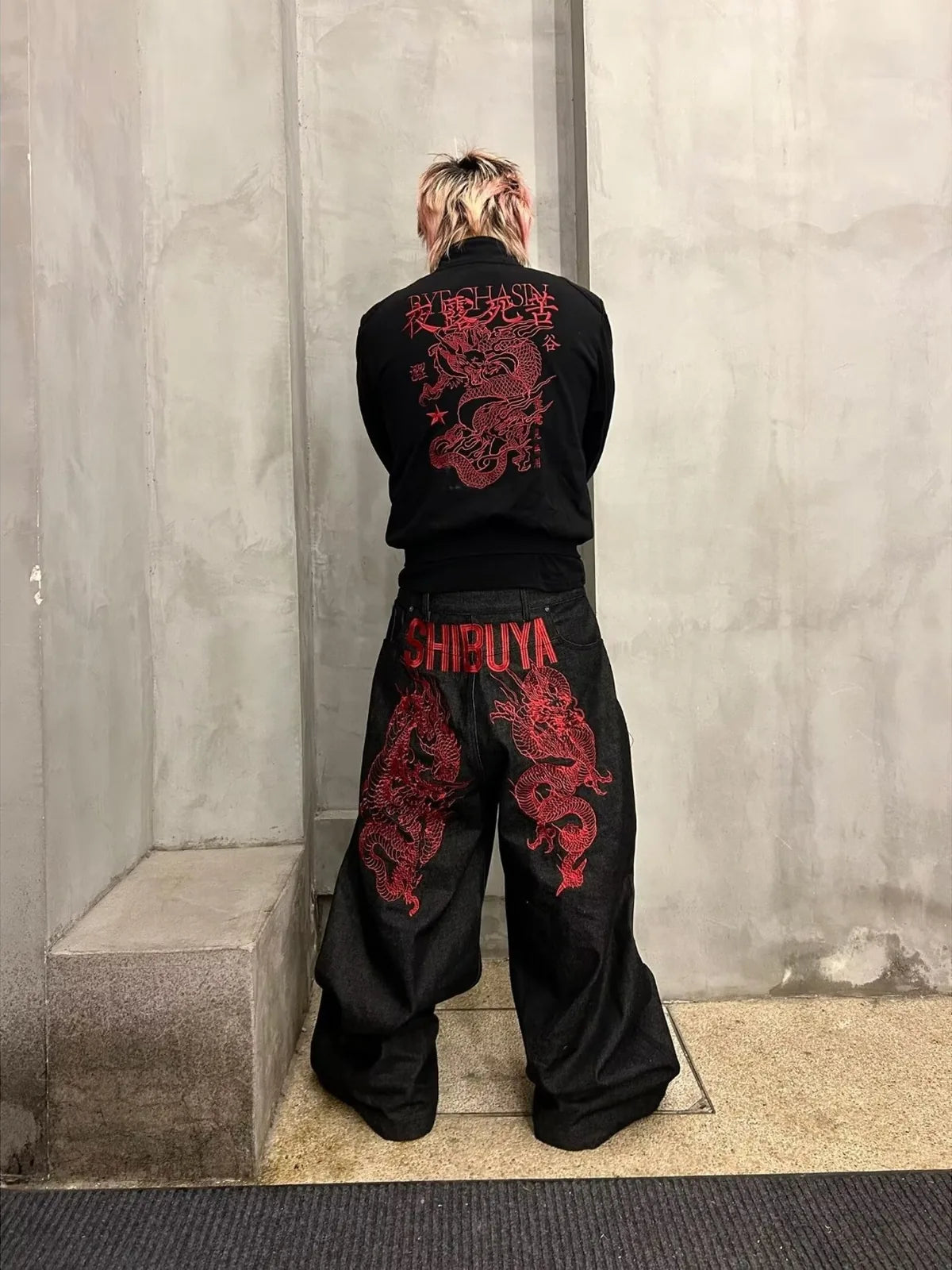 Black Shibuya Dragon Graphic Jeans styled from the back
