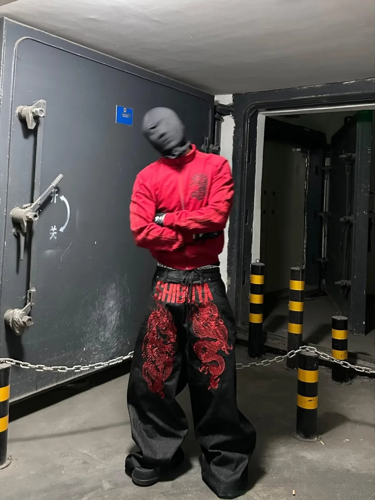 Black wide-leg Shibuya Dragon Graphic Jeans front styling