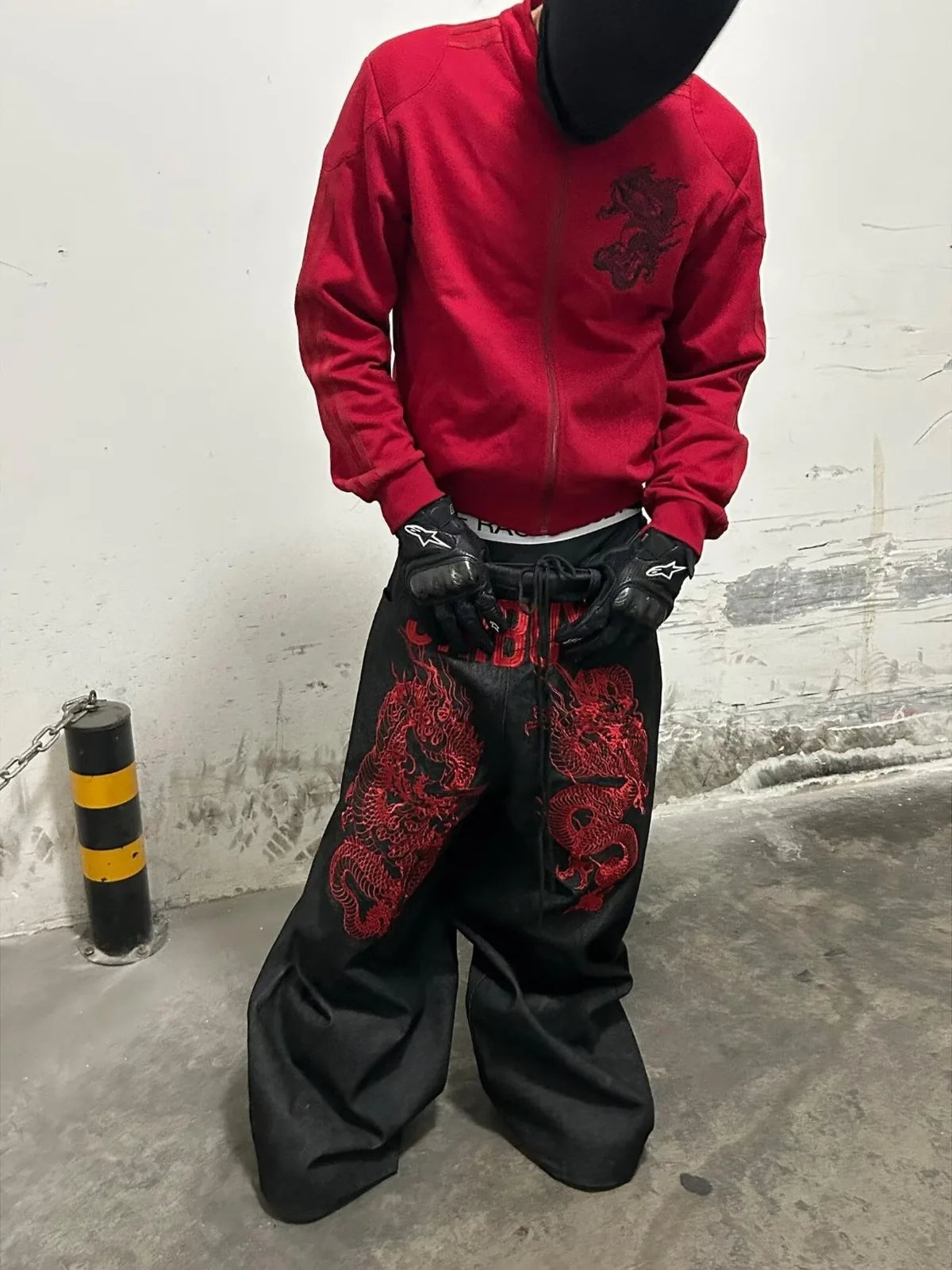 Black Shibuya Dragon Graphic Jeans styled from the front