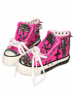 Pink studded high-top shoes flat sole angled view