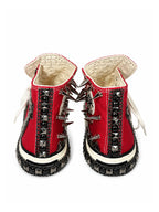 Back view of crimson red studded high-top sneakers