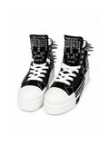 Black and white studded platform high-top sneakers, front angle