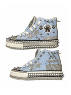 Baby-blue studded high-top sneakers with crystal stars, side views