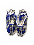 Klein-blue studded high-top sneakers with heel spikes, back top view