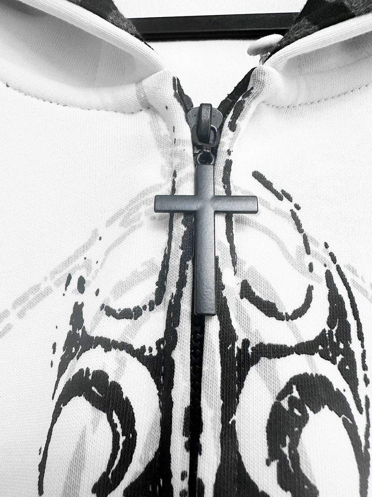 White Gothic Sigil zipper and front artwork close-up