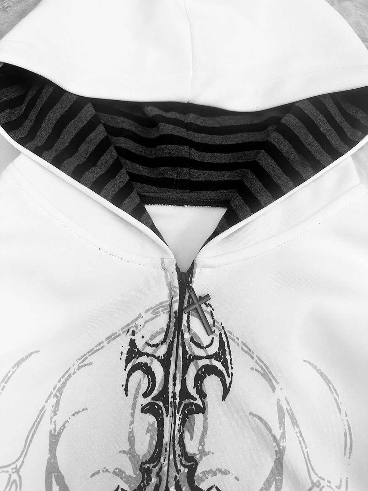 White Gothic Sigil striped hood and zipper close-up