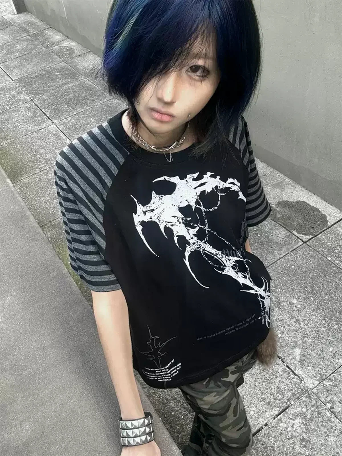 Black Midnight Verse Raglan Graphic Tee styled with a blue-hair streetwear look