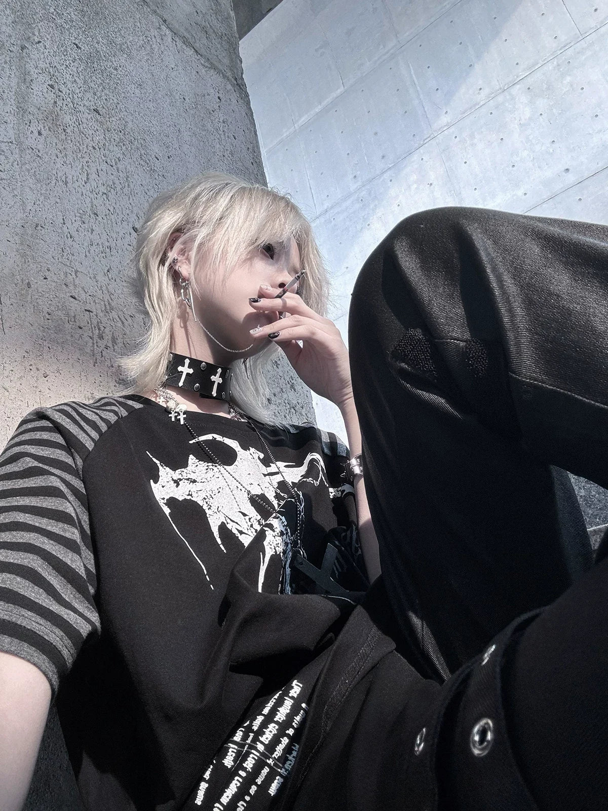 Close-up of the black Midnight Verse Raglan Graphic Tee front artwork