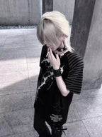 Black Midnight Verse Raglan Graphic Tee photographed from an overhead streetwear angle