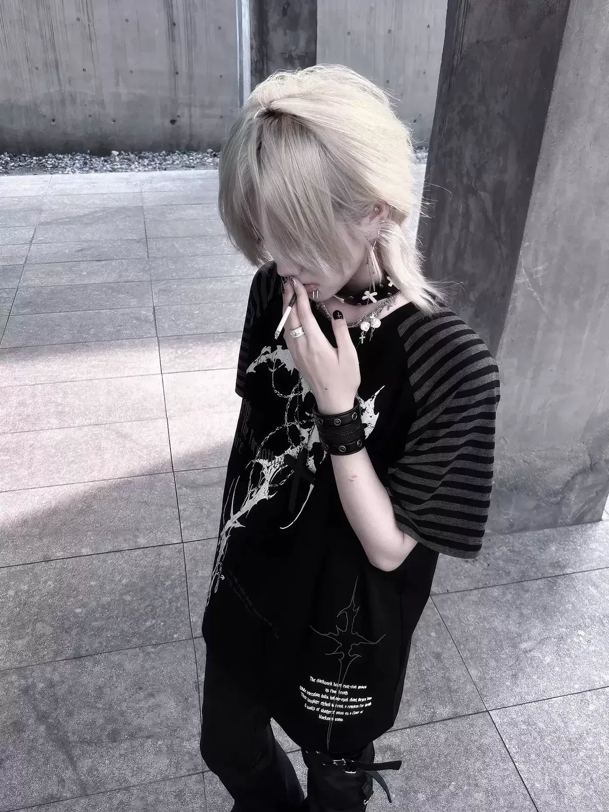 Black Midnight Verse Raglan Graphic Tee photographed from an overhead streetwear angle
