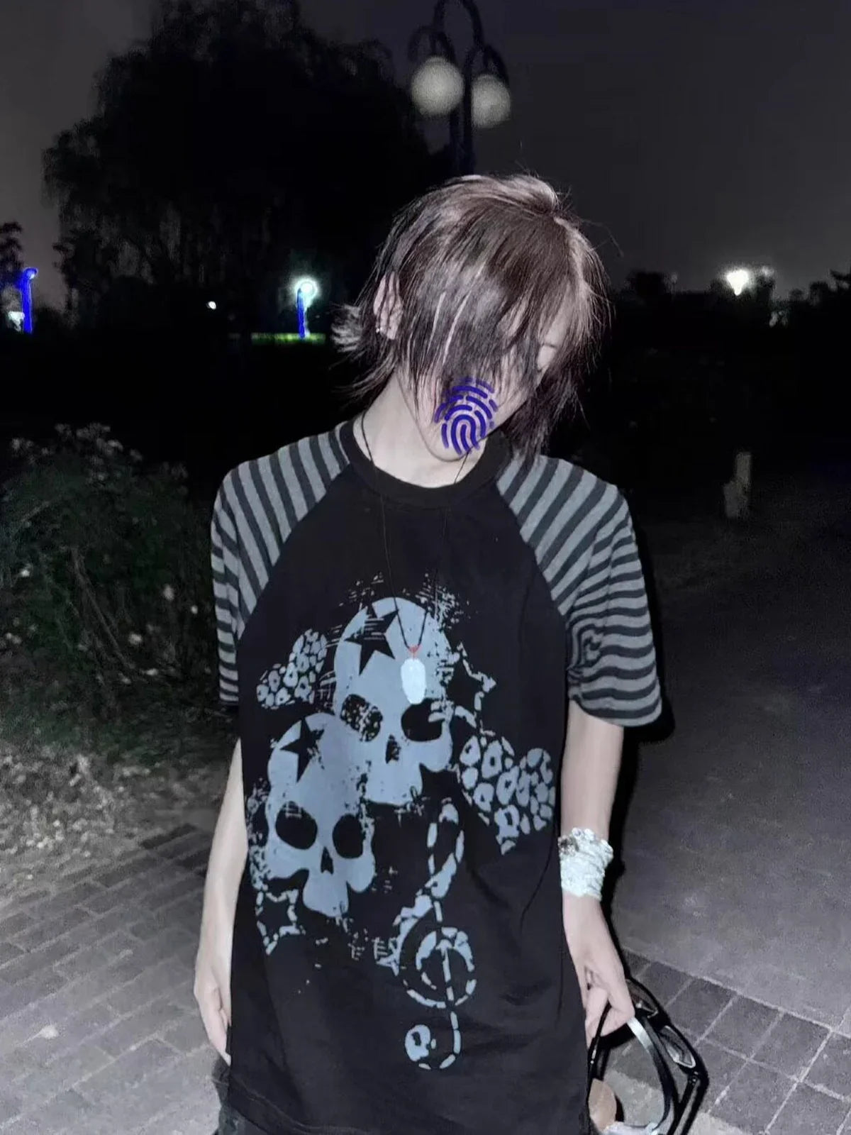 Black Skull Leopard Raglan Graphic Tee in a nighttime front streetwear look