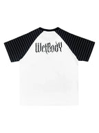 White Skull Leopard Raglan Graphic Tee back flatlay with gothic wordmark