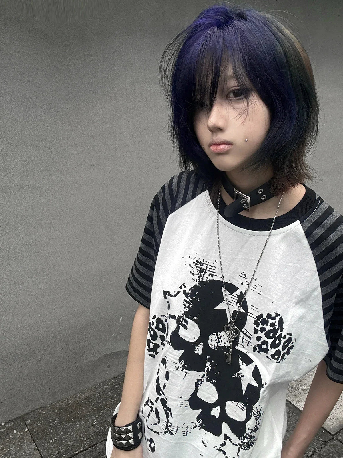 White Skull Leopard Raglan Graphic Tee styled in a blue-hair front look
