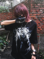 Black Thorned Spider Loose Graphic Tee styled outdoors