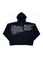 The Fragmented Script Zip Hoodie in black, front view